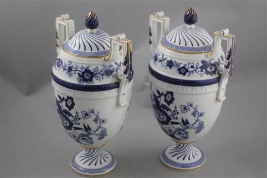 A pair of Copeland blue and white bone china oviform vases and covers, late 19th century, 30cm